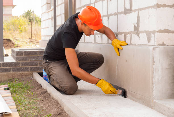 Waterproofing professionals working in Galveston, IN